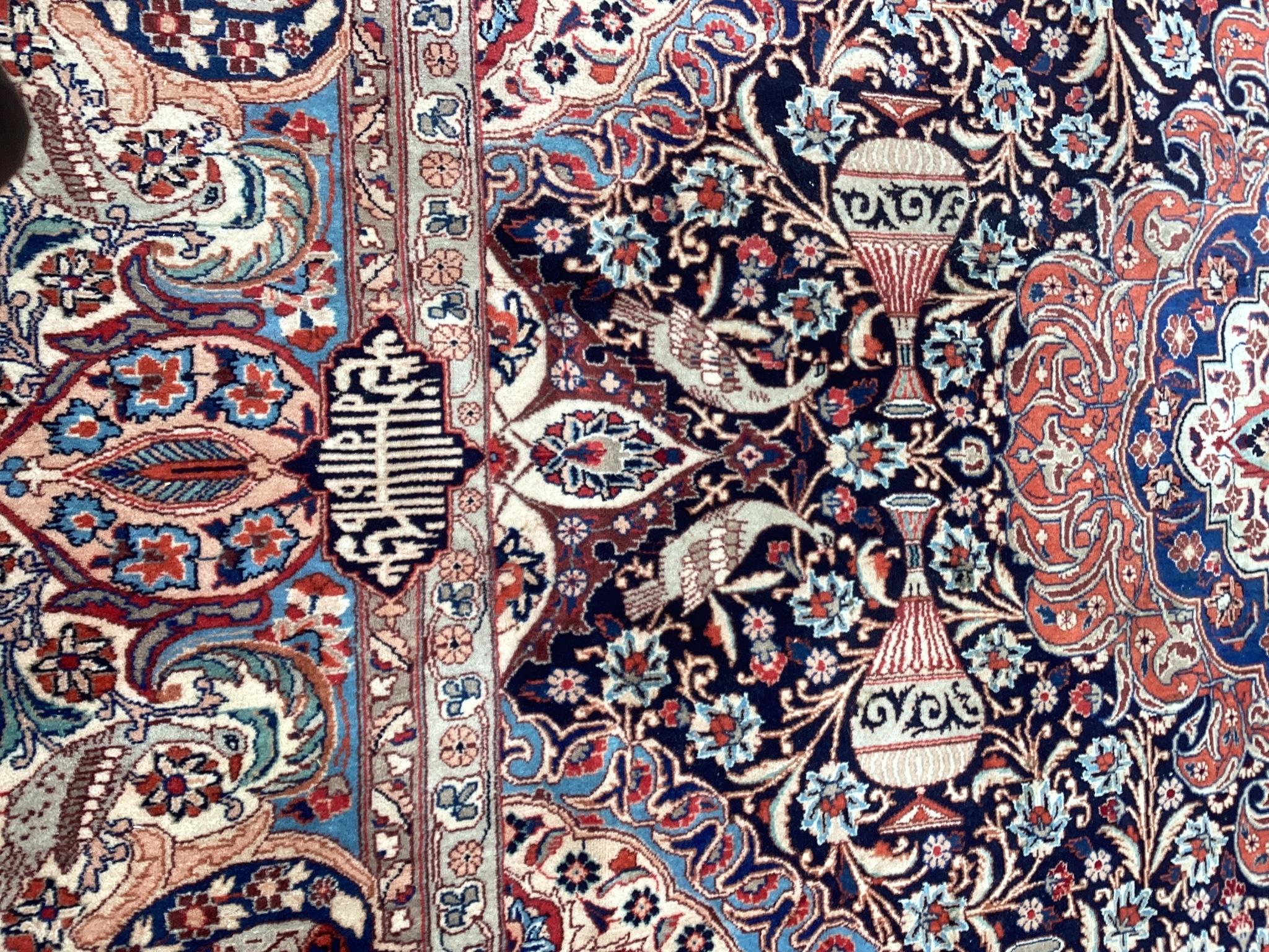 A Tabriz blue ground carpet, 390 x 290cm